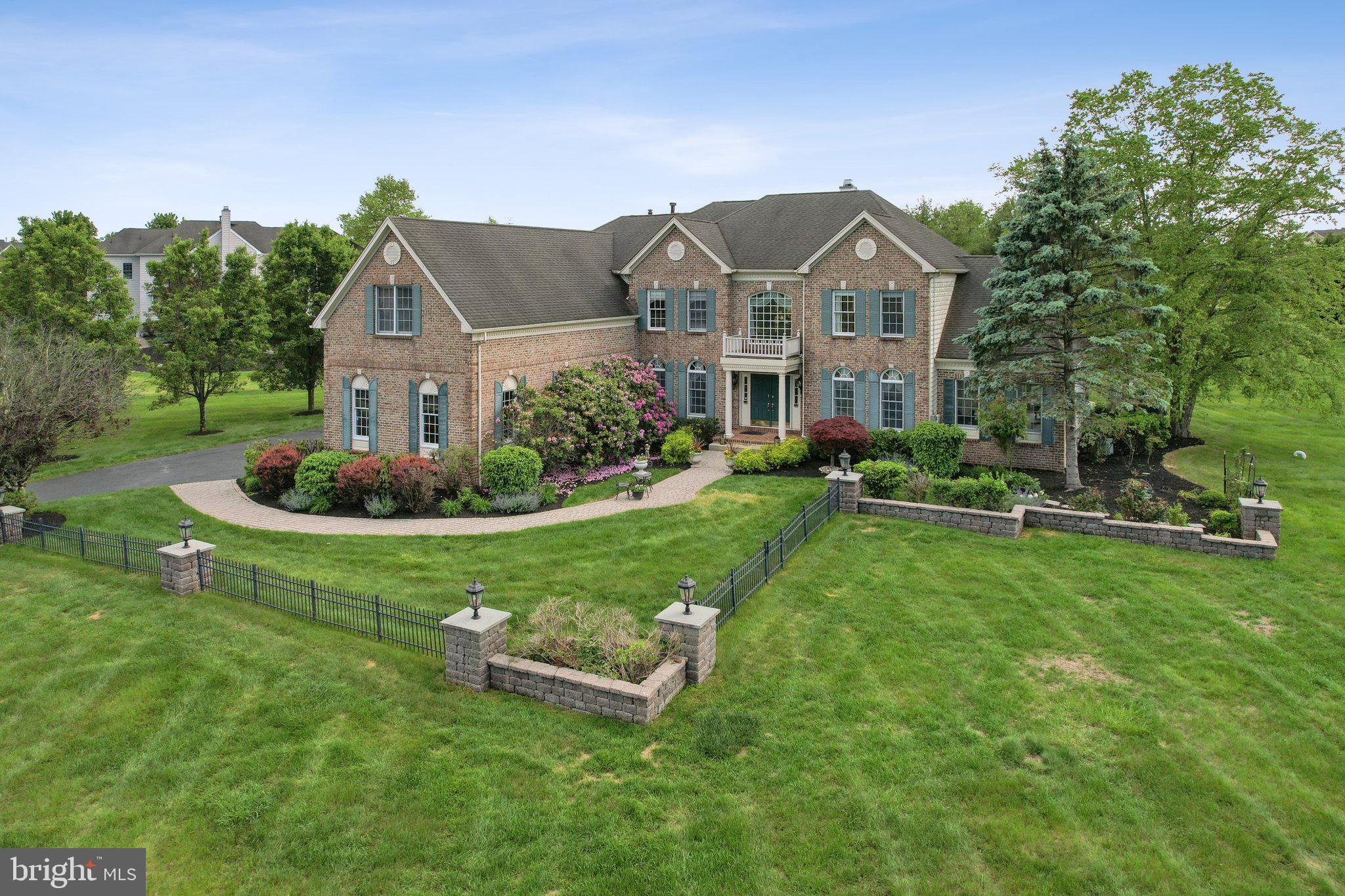1 Baker Way Pennington, NJ 08534 - Photo 60 of 77 a front view of a house with a yard