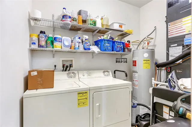 a utility room with dryer and washer