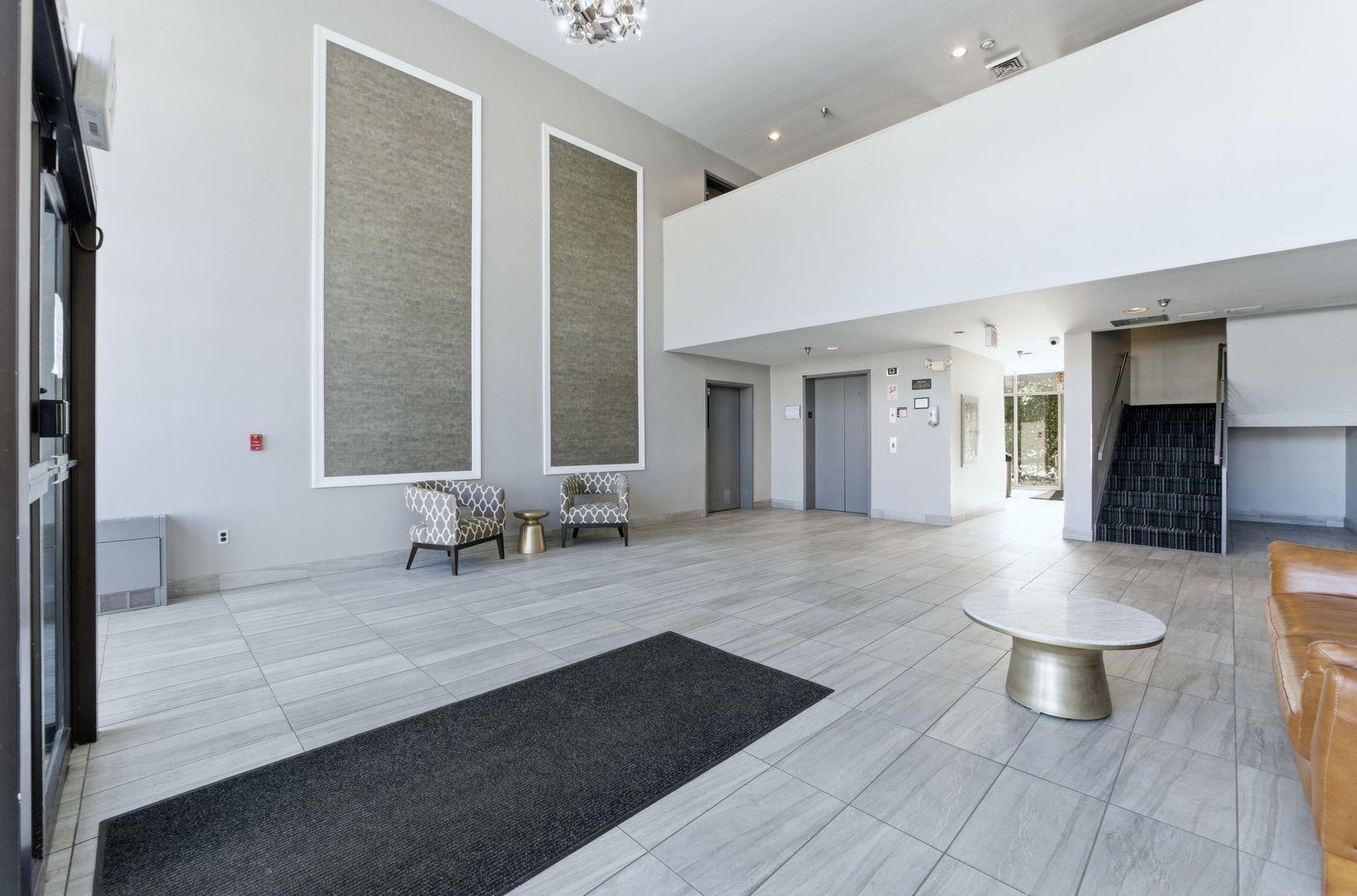 1111 River Road, Unit C6 Edgewater, NJ 07020 - Photo 13 of 16 a view of a bathroom with a sink and a mirror