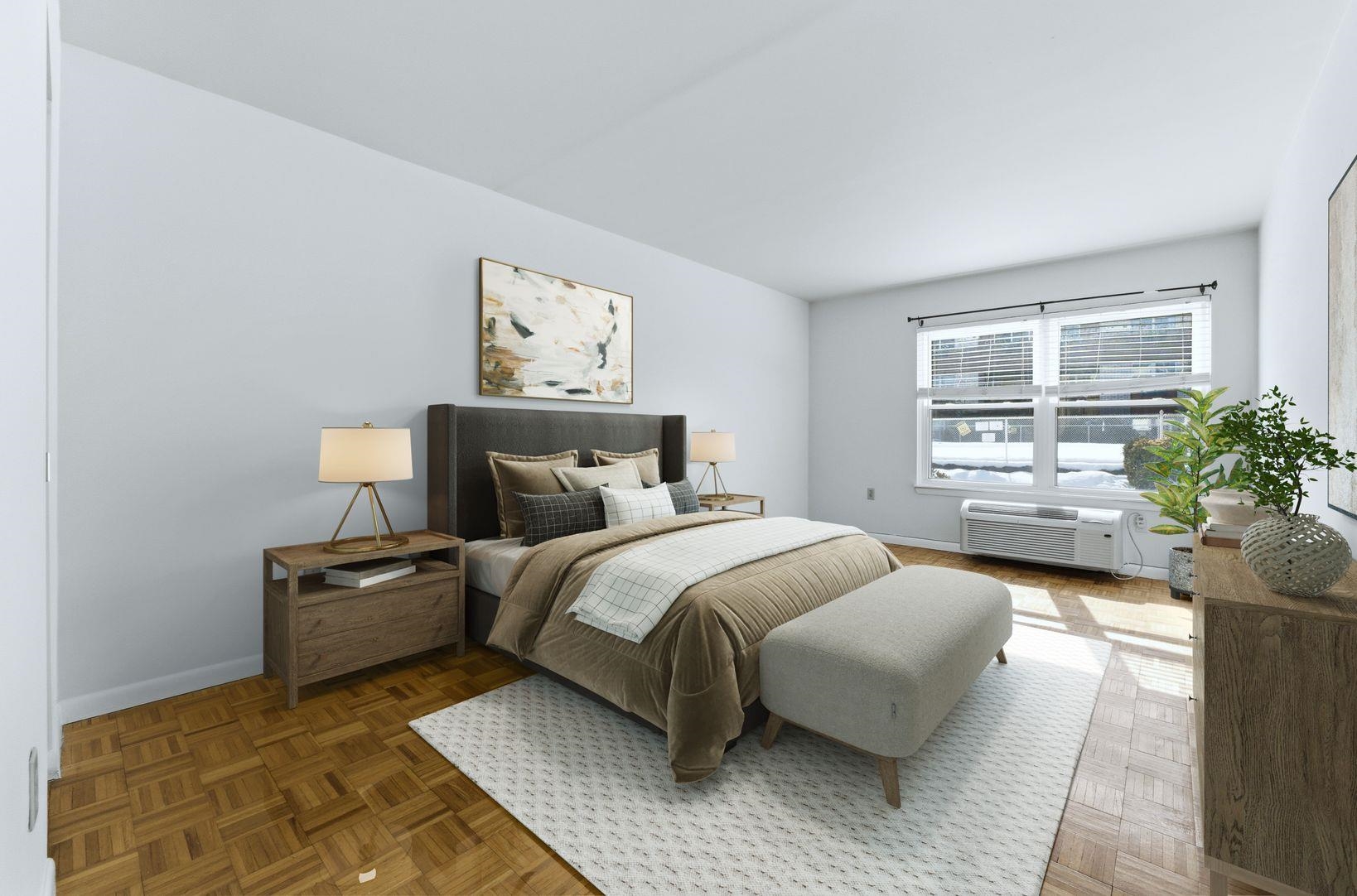 1111 River Road, Unit C6 Edgewater, NJ 07020 - Photo 10 of 16 a bedroom with a bed and window