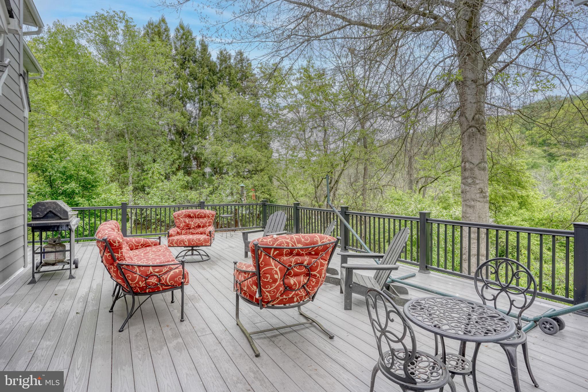 357 Willits Way Garnet Valley, PA 19060 - Photo 50 of 63 a balcony with wooden floor table and chairs
