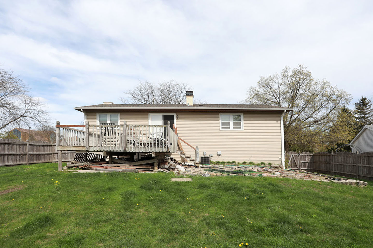 4624 Thornbark Drive Hoffman Estates, IL 60192 - Photo 25 of 30 a view of a house with a backyard and sitting area
