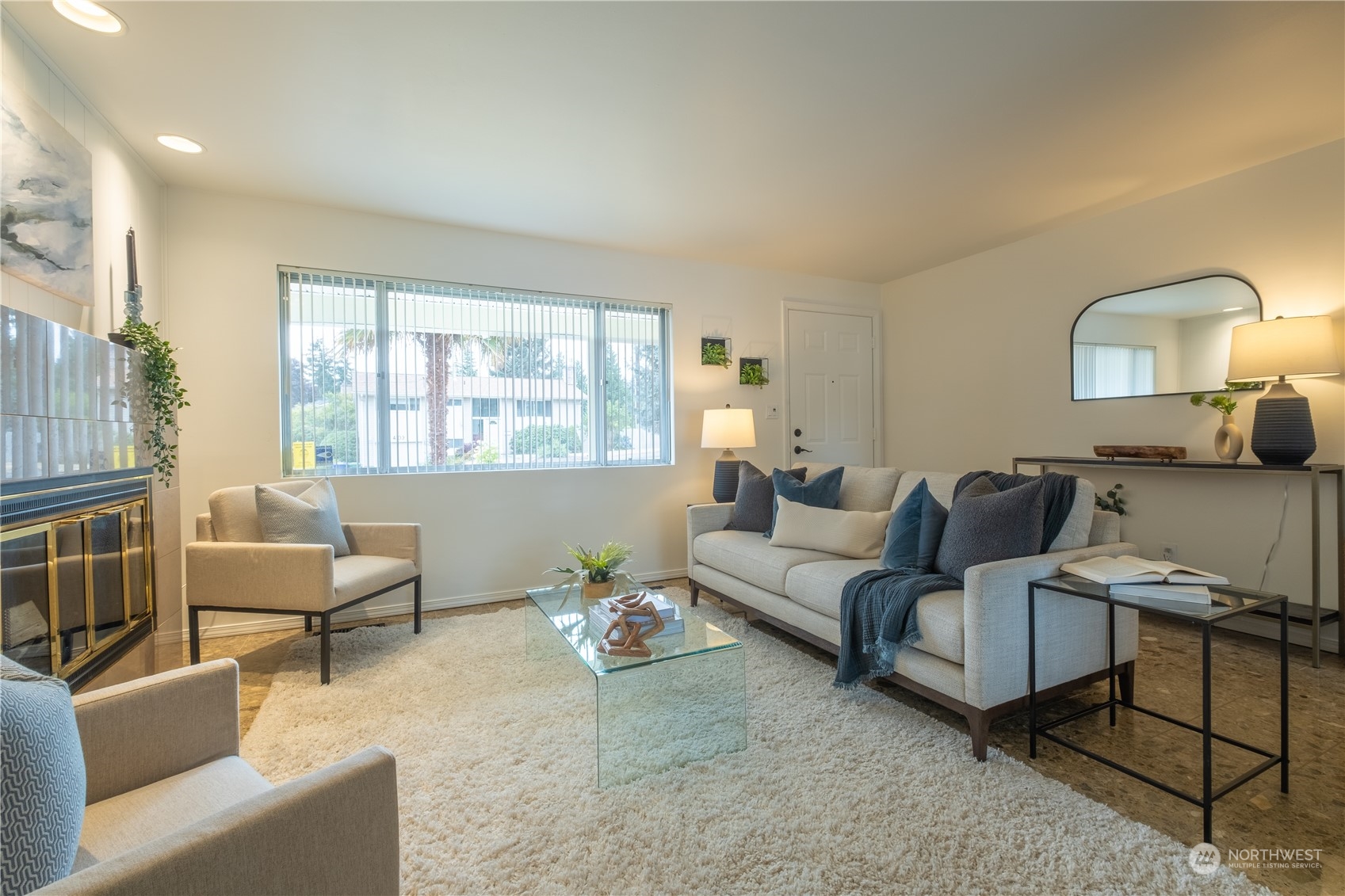 4100 Northeast 11th Street Renton, WA 98059 - Photo 2 of 27 a living room with furniture and a window