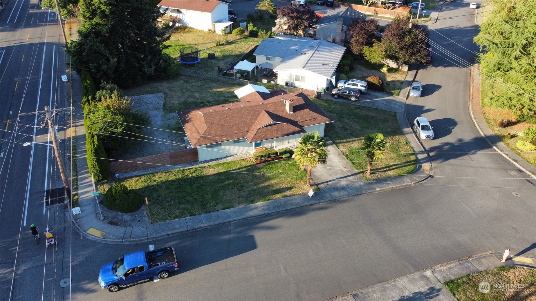 4100 Northeast 11th Street Renton, WA 98059 - Photo 24 of 27 an aerial view of a house with a yard and street