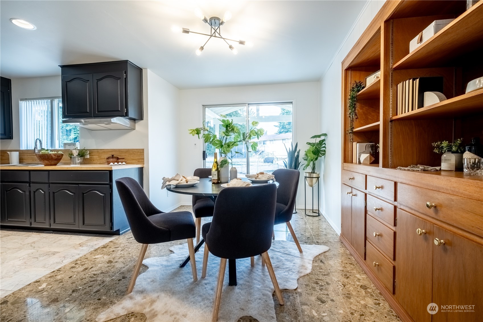 4100 Northeast 11th Street Renton, WA 98059 - Photo 5 of 27 a dining room with furniture and a window