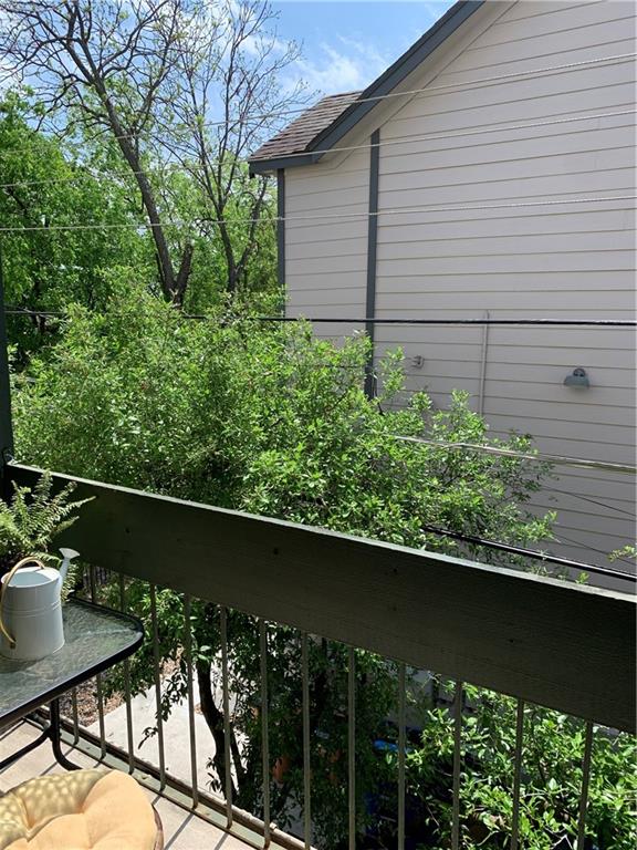 601 Nelray Boulevard, Unit 15 Austin, TX 78751 - Photo 6 of 6 a view of a chair and table in the balcony