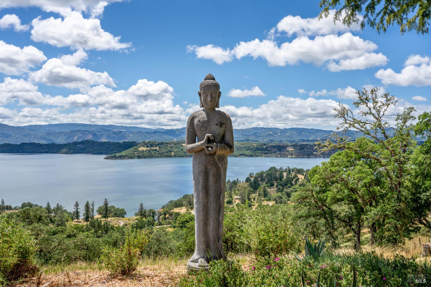 3760 King Ranch Road Ukiah, CA 95482 - Photo 2 of 44 a front view of a lake with a yard