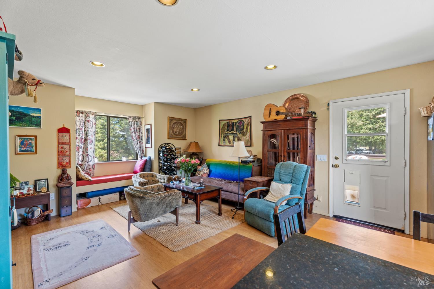 3760 King Ranch Road Ukiah, CA 95482 - Photo 23 of 44 a living room with furniture a rug and a window