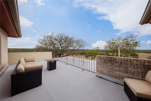 a view of living room filled with furniture
