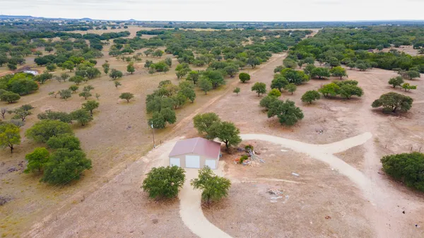 a view of a backyard of the house