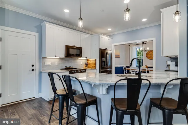 a view of a dining room with furniture