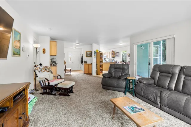 a living room with furniture and a couch
