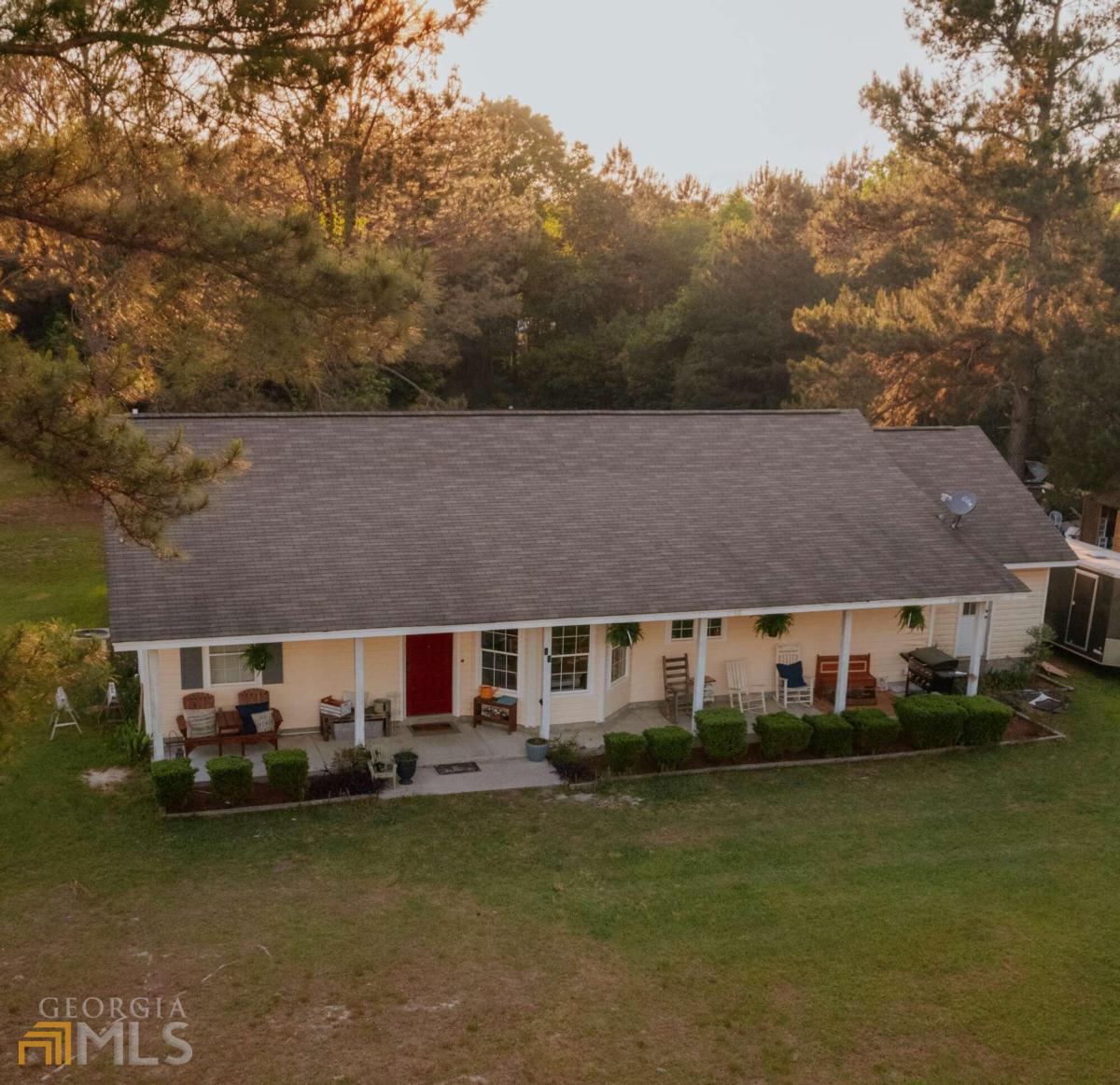 43 Beech Road Hazlehurst, GA 31539 - Photo 1 of 1 an aerial view of a house with swimming pool garden and patio