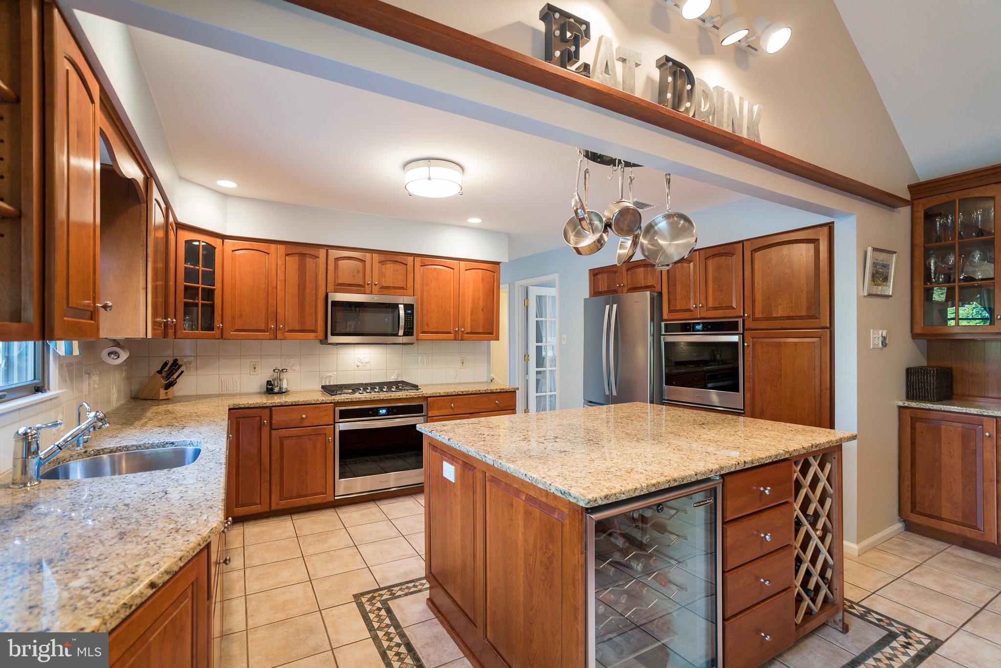 6 Winthrop Road Lawrenceville, NJ 08648 - Photo 6 of 24 Updated cherry, granite & new stainless steel kit.