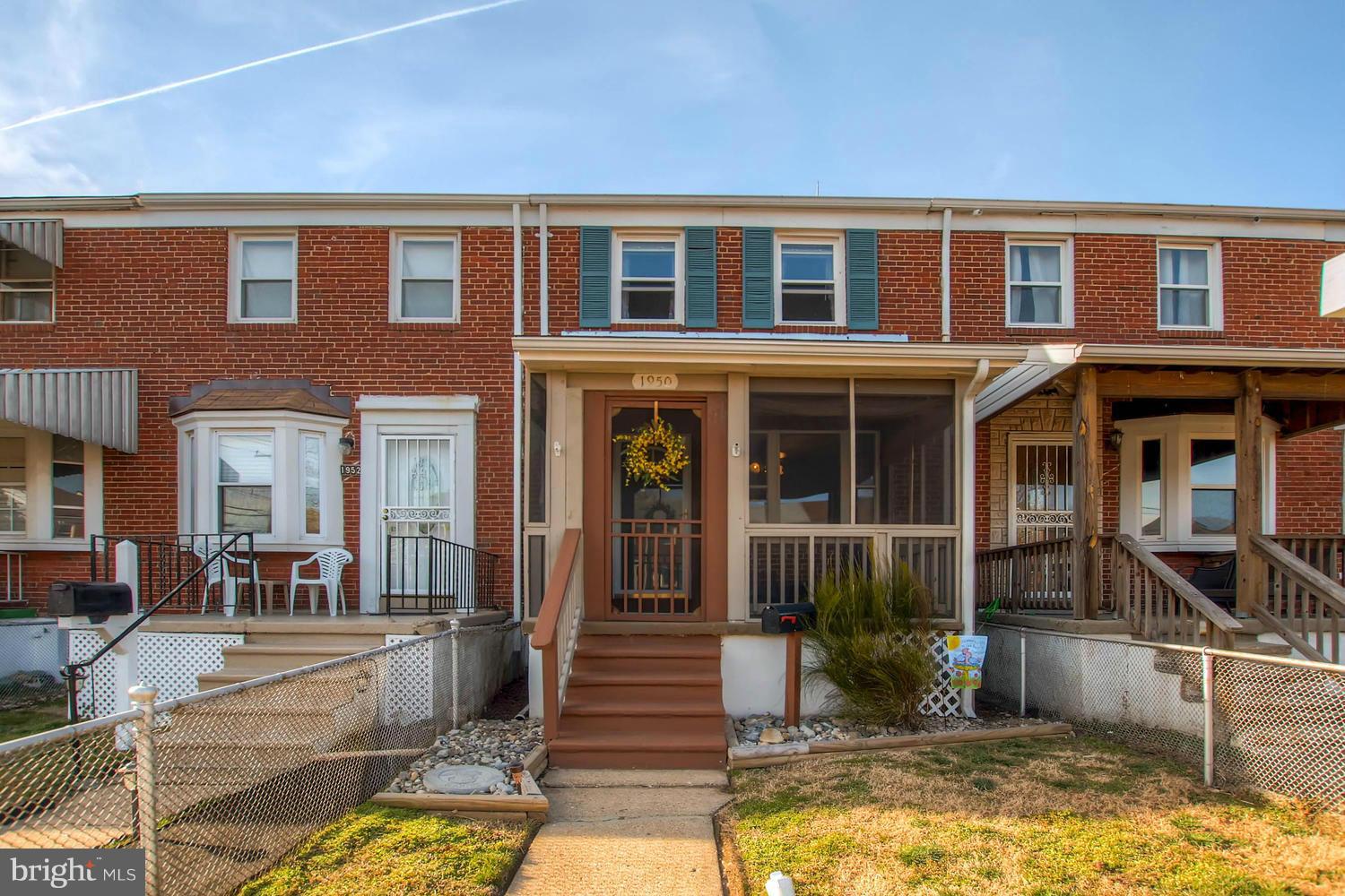 1950 Quentin Road Baltimore, MD 21222 - Photo 1 of 27 a front view of a house with a swimming pool