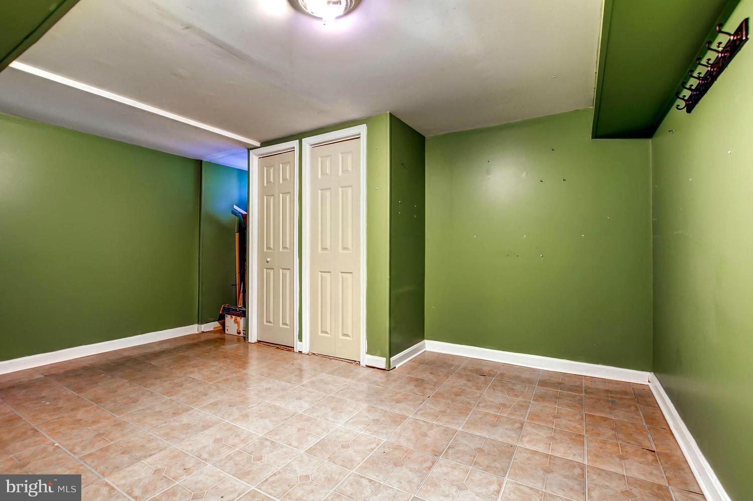 1950 Quentin Road Baltimore, MD 21222 - Photo 23 of 27 an empty room with closet