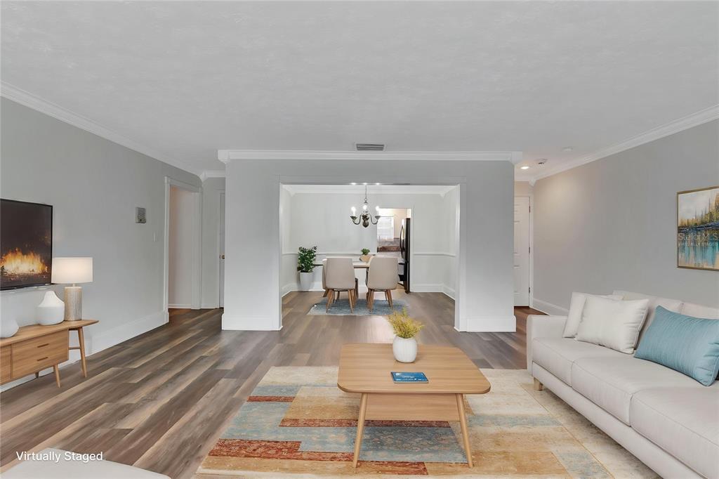 4216 Lake Underhill Road, Unit 6A28 Orlando, FL 32803 - Photo 3 of 18 a living room with furniture