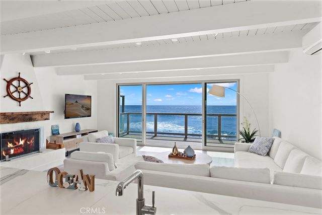 a view of a porch with a floor to ceiling window