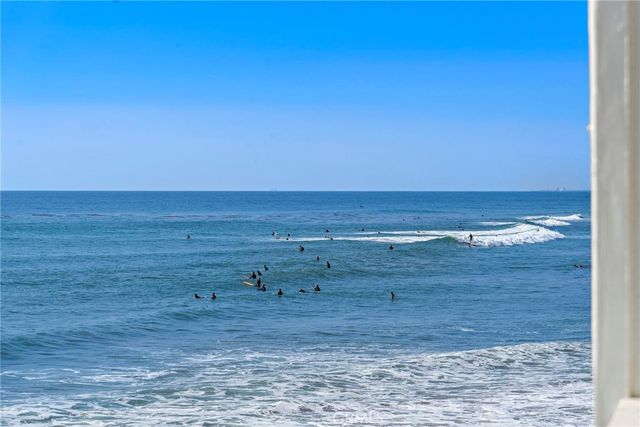 a view of a livingroom with furniture and a table