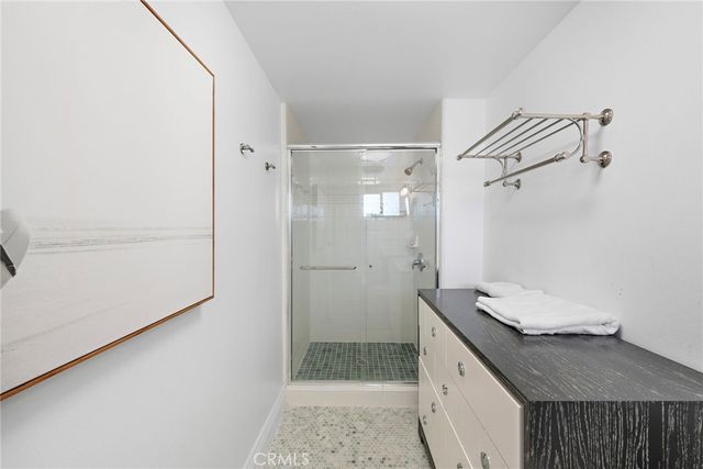a utility room with sink dryer and washer