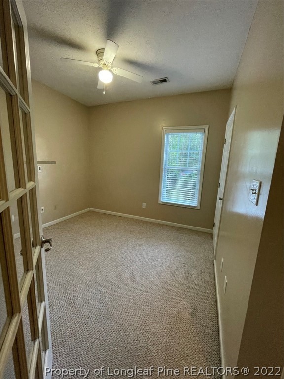 517 Lionshead Road, Unit 4 Fayetteville, NC 28311 - Photo 12 of 19 a view of an empty room with a window