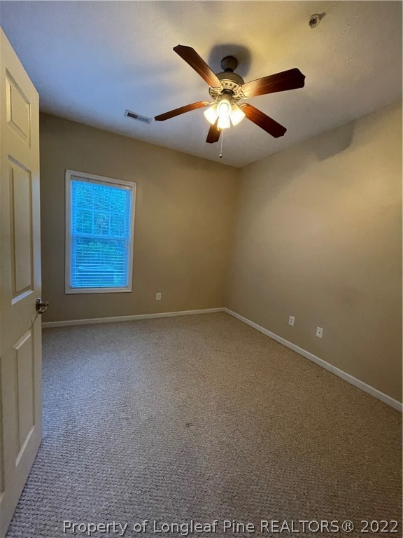 517 Lionshead Road, Unit 4 Fayetteville, NC 28311 - Photo 15 of 19 en empty room with windows