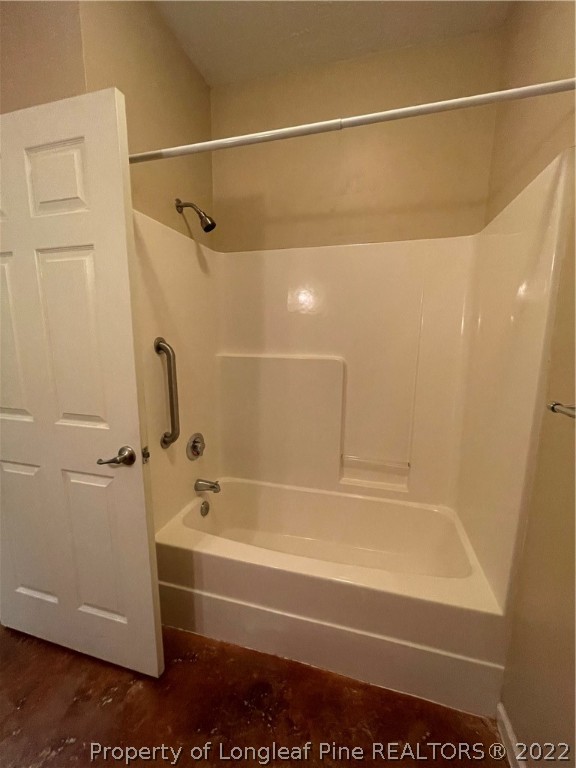 517 Lionshead Road, Unit 4 Fayetteville, NC 28311 - Photo 16 of 19 a bathroom with a bathtub and a shower