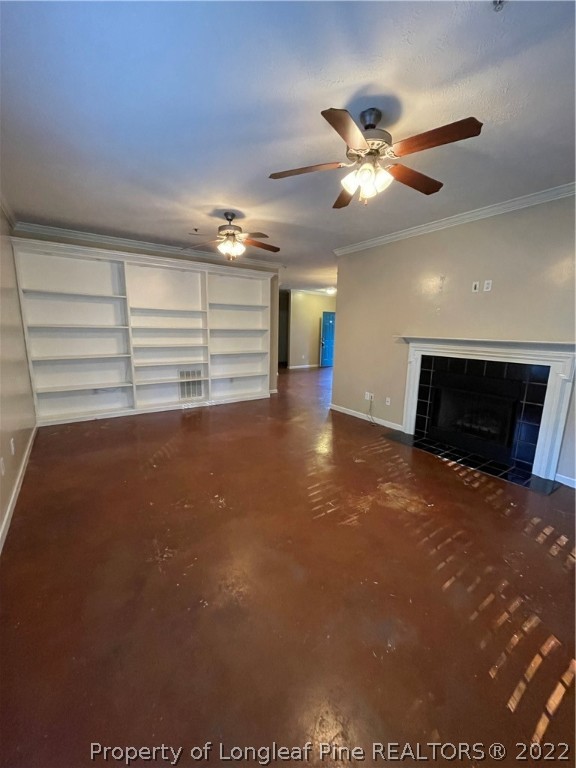 517 Lionshead Road, Unit 4 Fayetteville, NC 28311 - Photo 4 of 19 a view of a livingroom with a ceiling fan and window