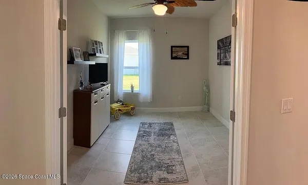 a bathroom with a double vanity sink and mirror