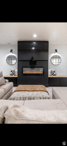 1276 West Fallow Way, Unit 76 Ogden, UT 84414 - Photo 17 of 22 Detailed view of a glass covered fireplace