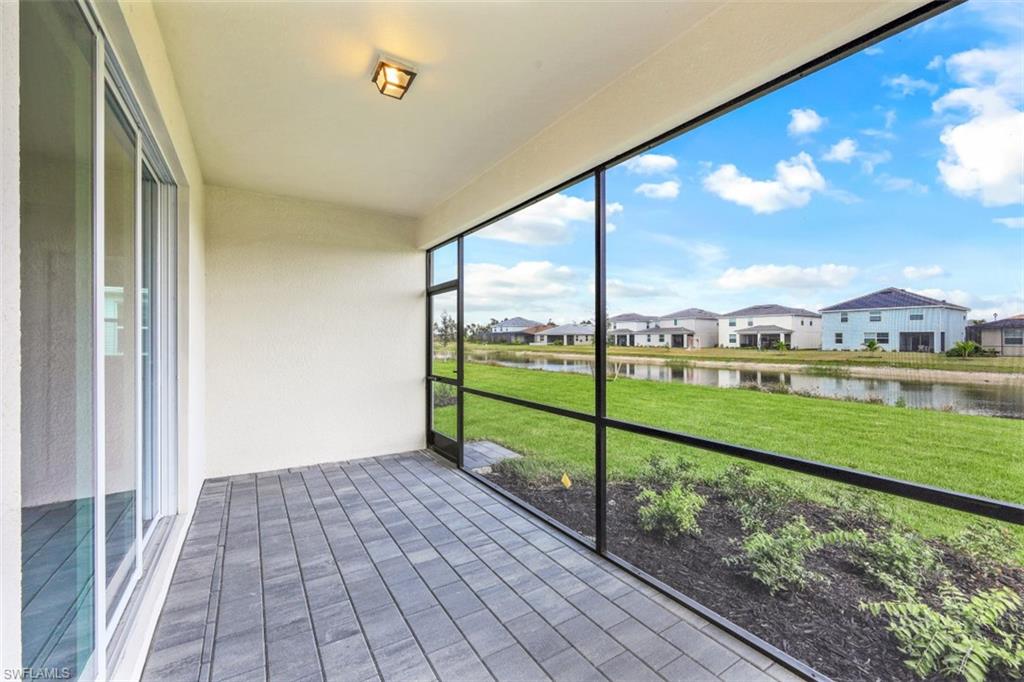 2434 Orchard Street Naples, FL 34120 - Photo 21 of 29 a view of a street from a balcony