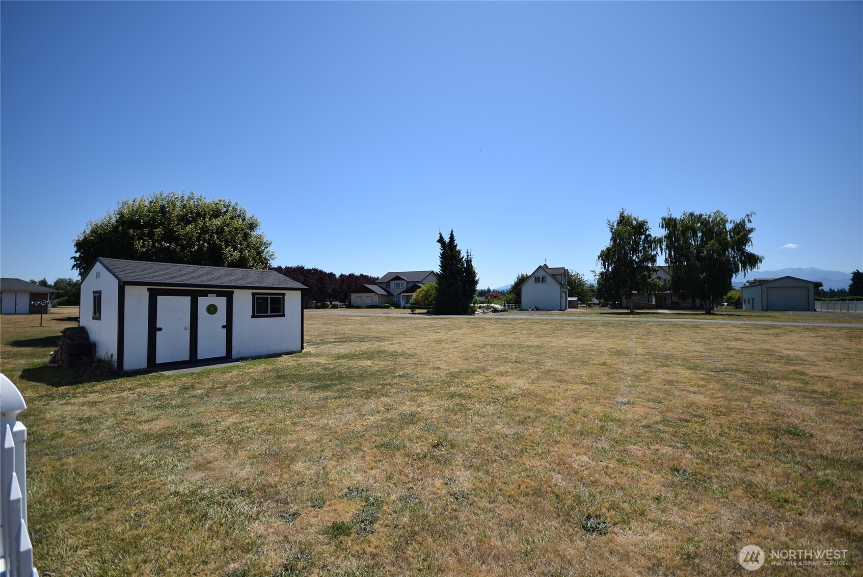 71 John Carl Road Sequim, WA 98382 - Photo 37 of 37 a view of a house with a yard