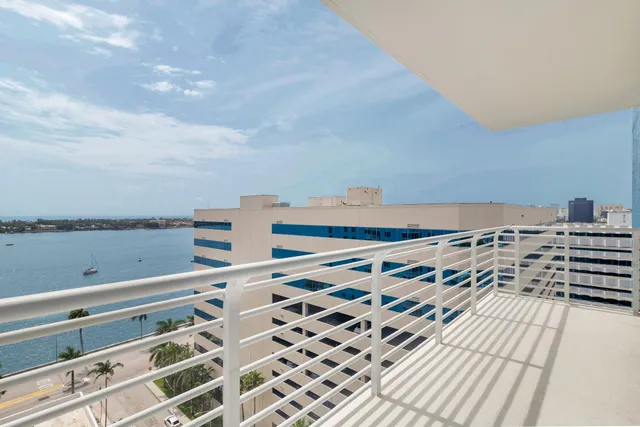 a view of balcony with wooden floor