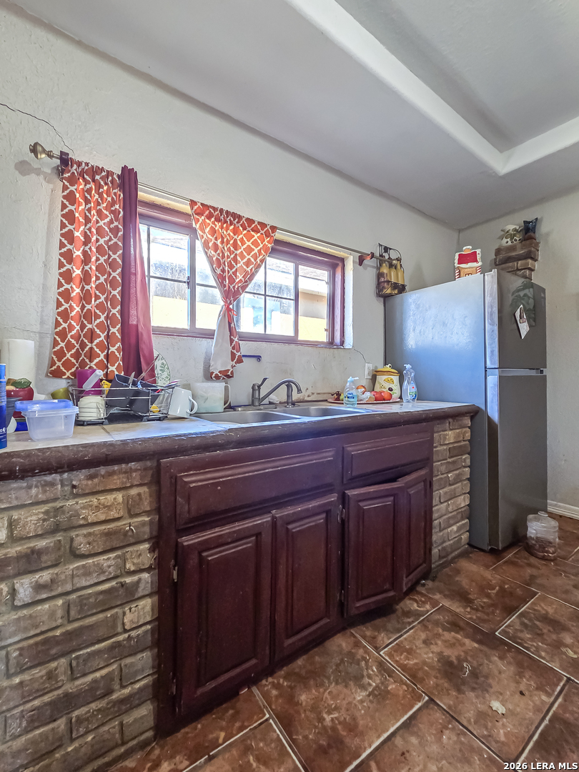584 Chula Vista Road Eagle Pass, TX 78852 - Photo 16 of 17 a room with a dresser and a window