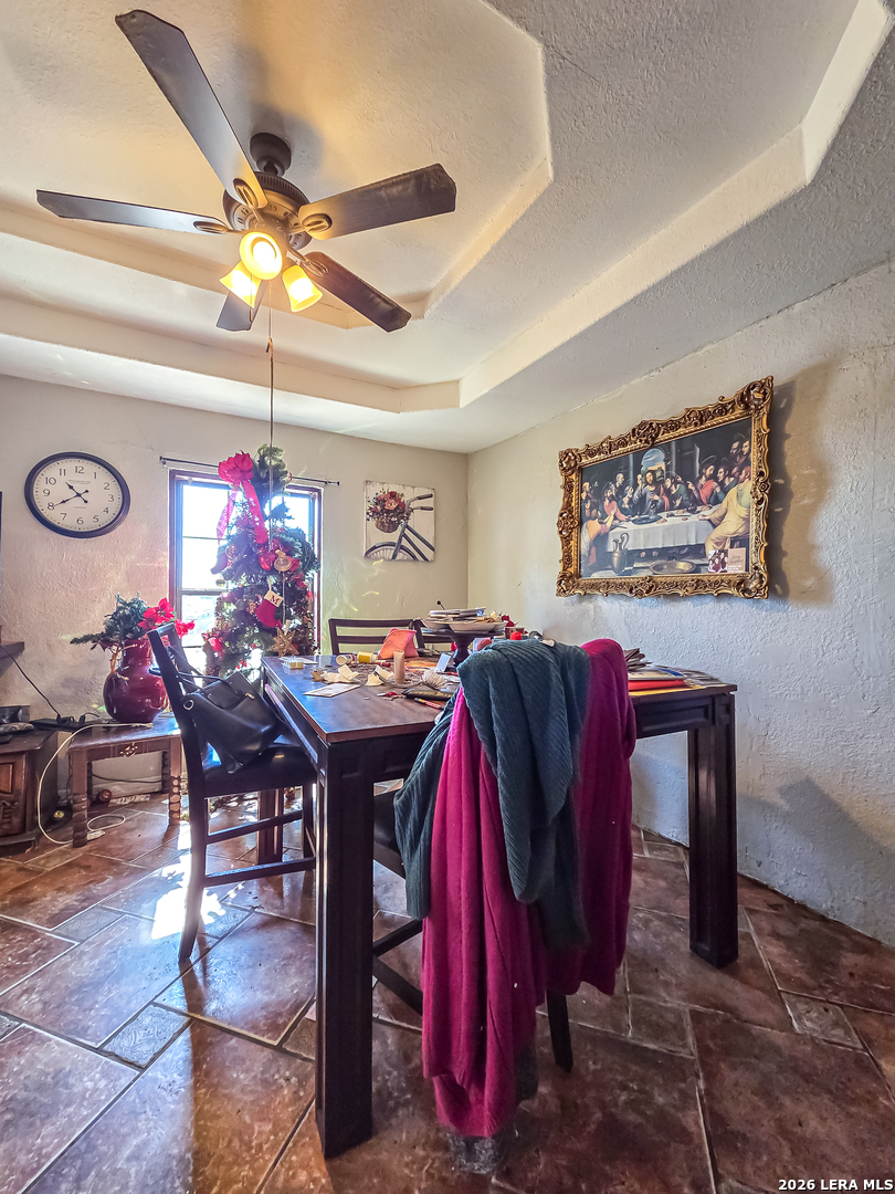 584 Chula Vista Road Eagle Pass, TX 78852 - Photo 17 of 17 a view of a dining room with furniture and chandelier