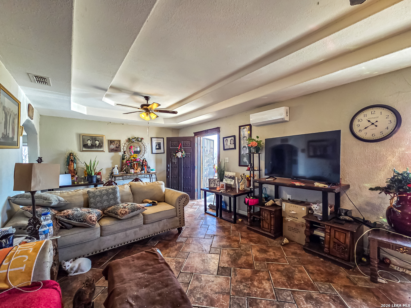 584 Chula Vista Road Eagle Pass, TX 78852 - Photo 4 of 17 a living room with furniture and a flat screen tv