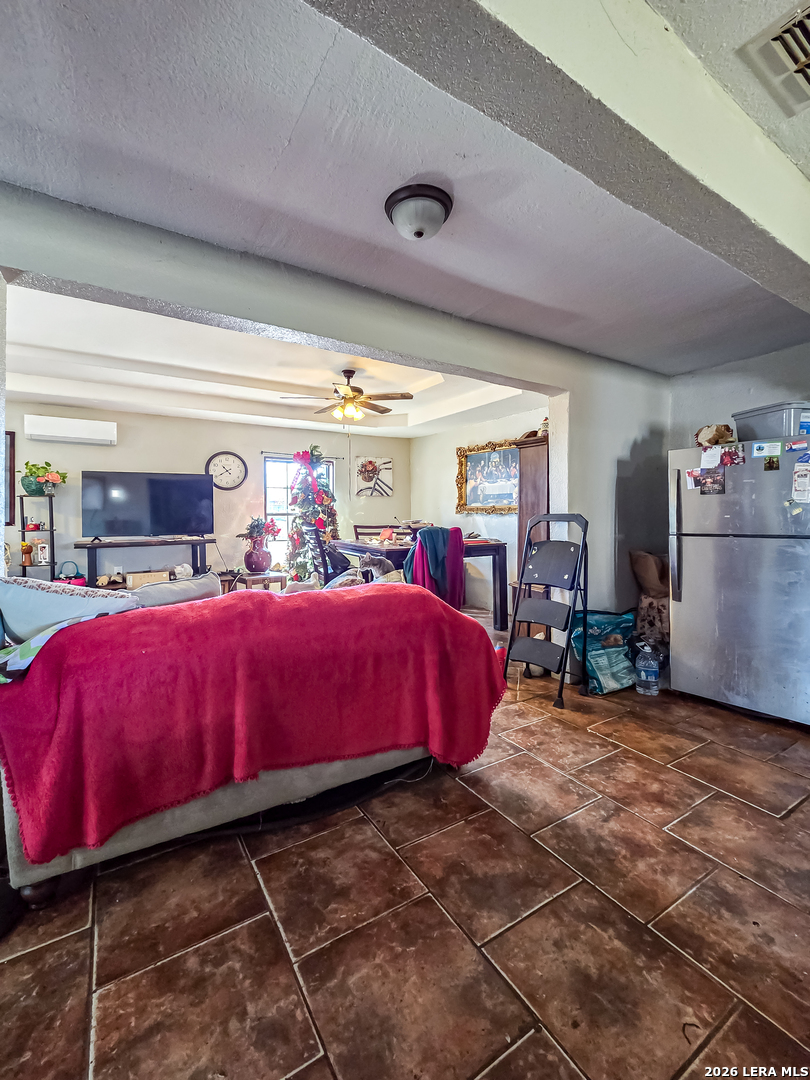 584 Chula Vista Road Eagle Pass, TX 78852 - Photo 6 of 17 a bedroom with furniture and a large window