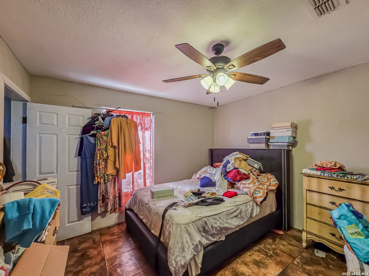 584 Chula Vista Road Eagle Pass, TX 78852 - Photo 7 of 17 a bedroom with a bed and a closet