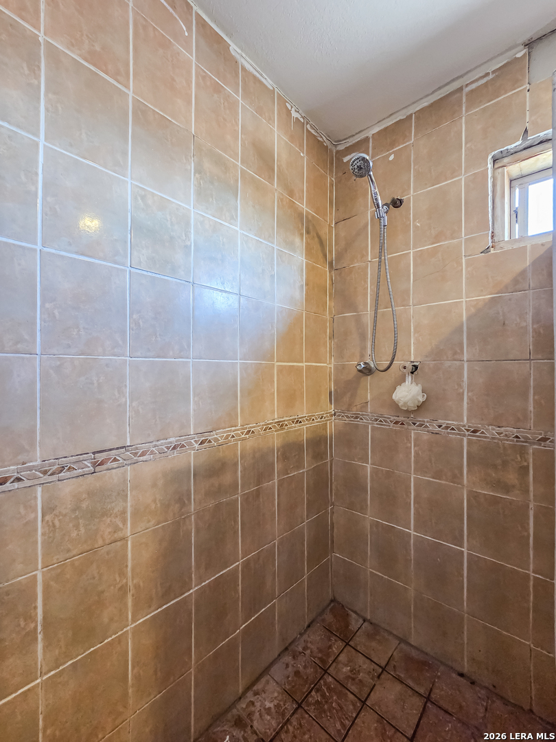 584 Chula Vista Road Eagle Pass, TX 78852 - Photo 8 of 17 a bathroom with a shower