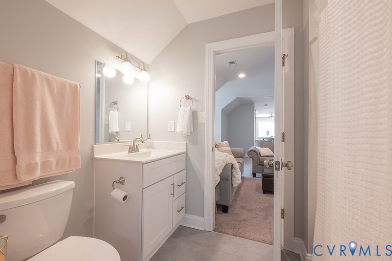 9425 Marie Road New Kent, VA 23124 - Photo 20 of 55 a bathroom with a sink vanity mirror and toilet