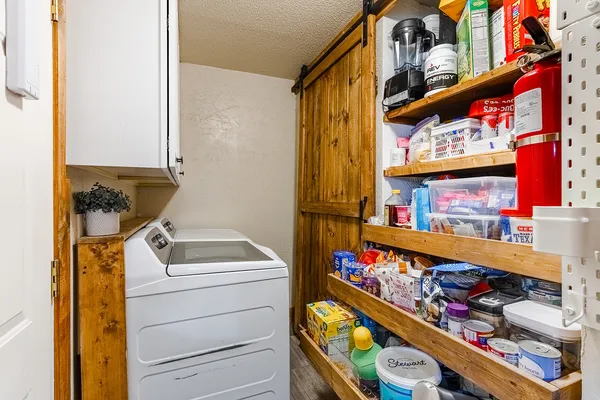 a room with storage and utility