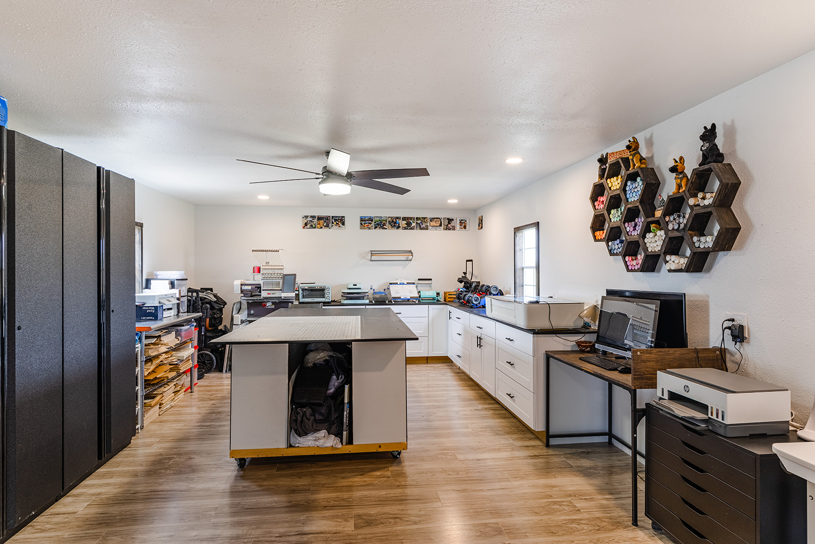 1001 Gravel Pit Road Taylor, TX 76574 - Photo 24 of 40 a large white kitchen with a large counter space and stainless steel appliances