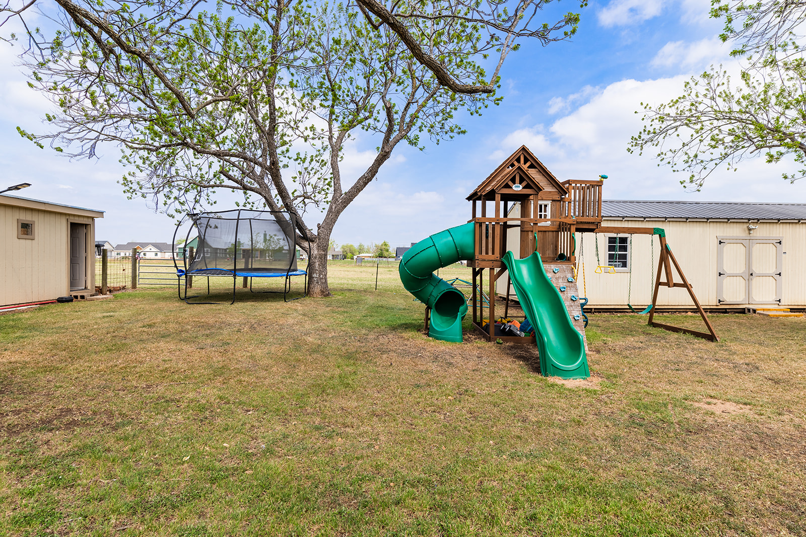 1001 Gravel Pit Road Taylor, TX 76574 - Photo 28 of 40 a view of outdoor space with playground and green space