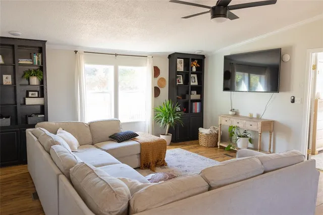 a view of a workspace with furniture