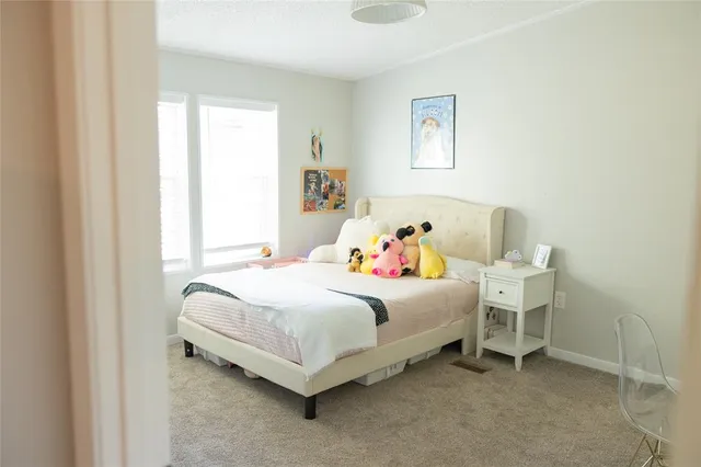 a kitchen with a sink appliances and cabinets