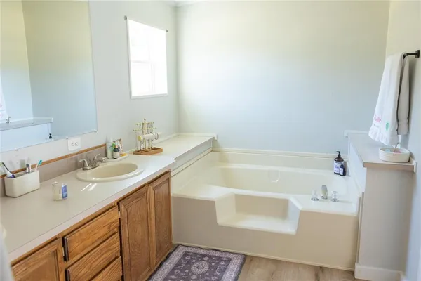a view of a livingroom with furniture and window