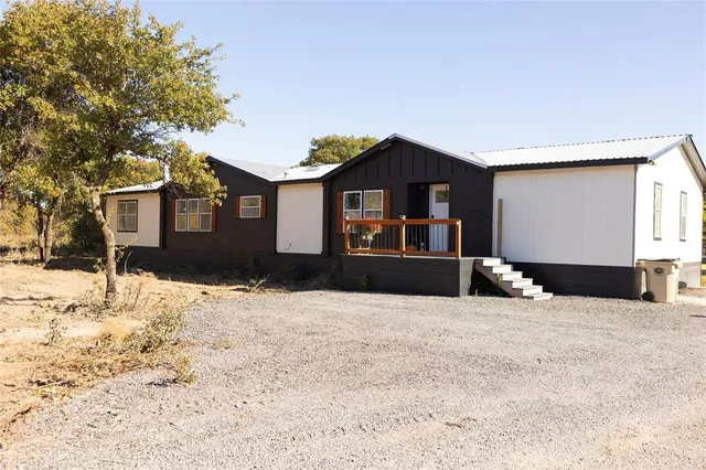 a balcony view with a seating space
