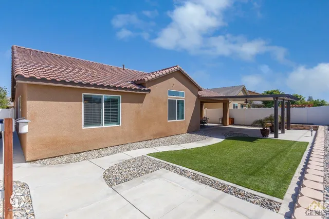 a view of a house with a garden