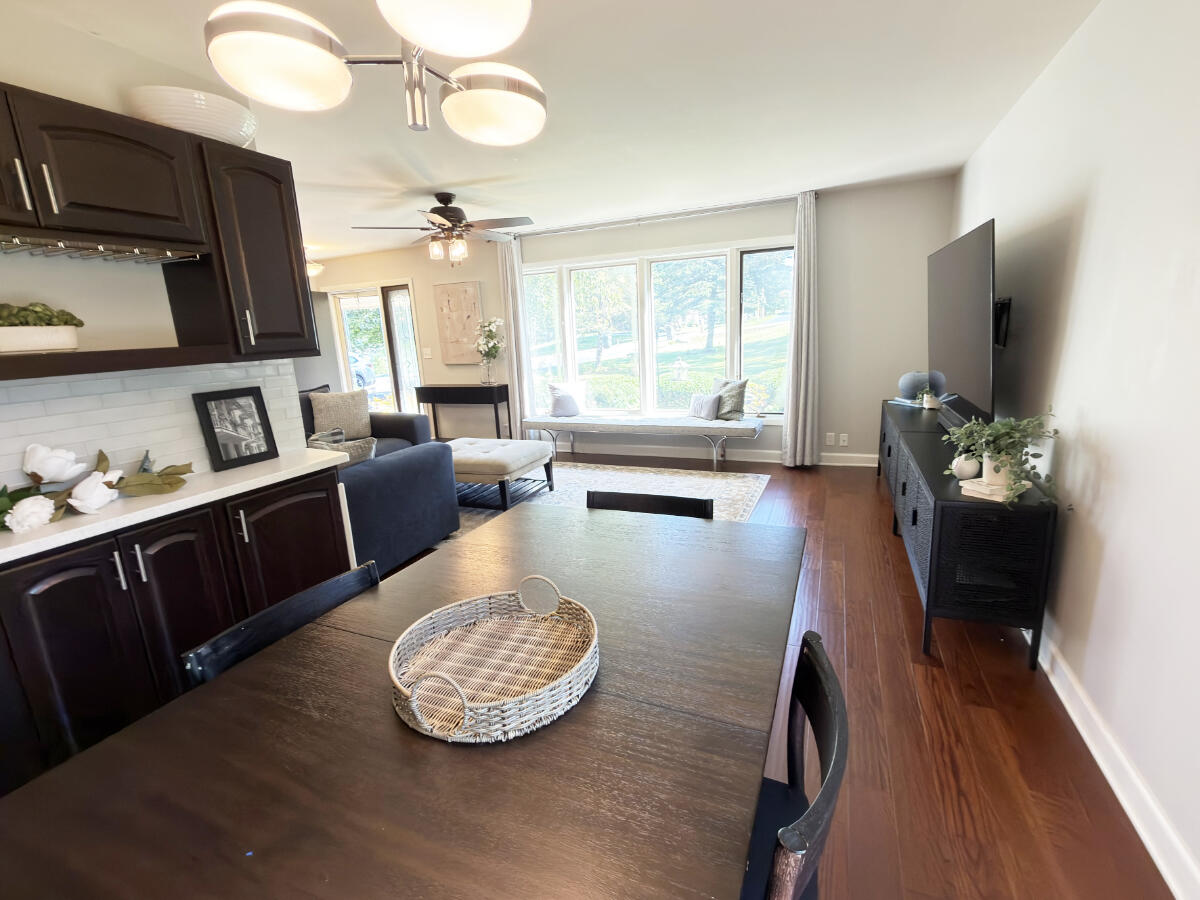 W240N4035 Swan Road Pewaukee, WI 53072 - Photo 7 of 27 Dining into Living Room