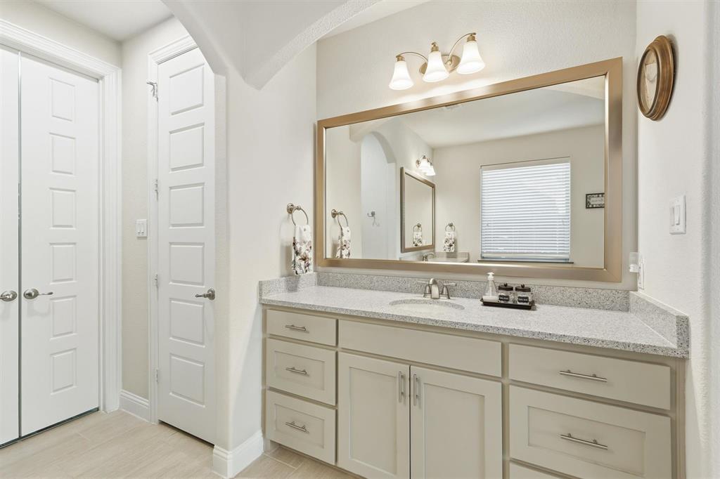 6371 Whiskerbrush Road Flower Mound, TX 76226 - Photo 17 of 38 Neutral elegant color cabinetry and upgraded countertop